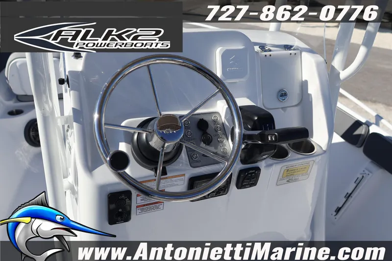 Slide: The Image of 2026 ALK2 Powerboats 23 CRX dashboard with steering wheel and controls. - 7