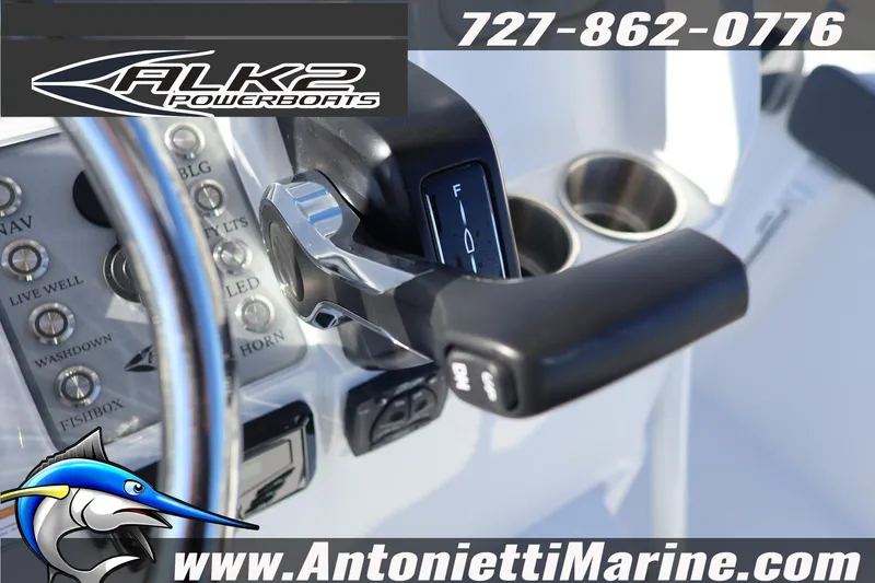 Slide: The Image of Close-up of 2026 ALK2 Powerboats 23 CRX throttle control and dashboard. - 9