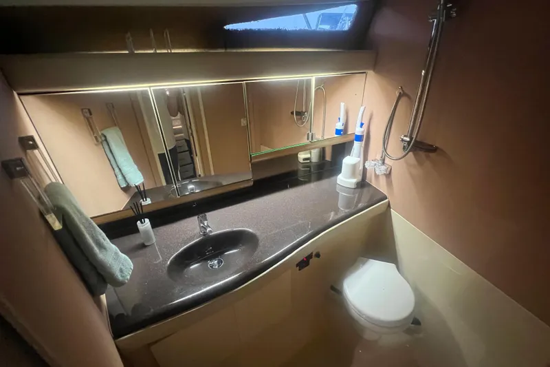 Slide: The Image of Interior of 1989 Bayliner 4285 Avanti yacht kitchen with appliances and storage. - 22