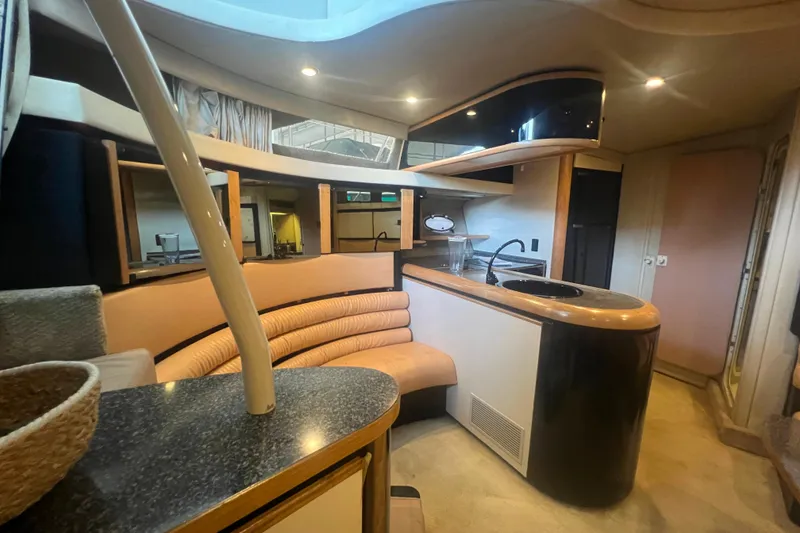 Slide: The Image of 1989 Bayliner 4285 Avanti yacht interior with bathroom and cozy cabin space. - 31