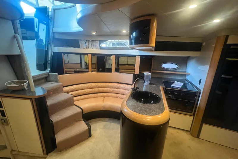 Slide: The Image of 1989 Bayliner 4285 Avanti bathroom with modern sink, mirror, and shower. - 33