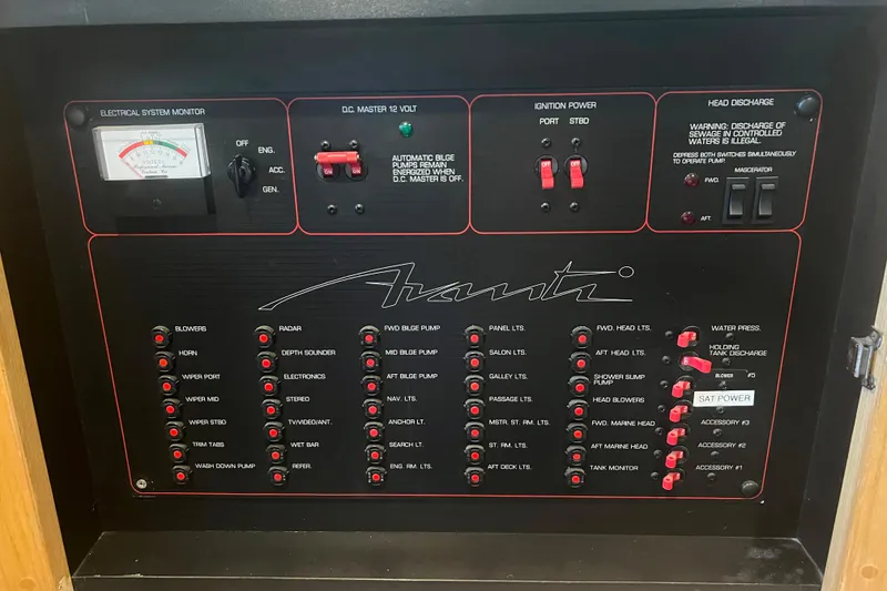 Slide: The Image of Control panel of 1989 Bayliner 4285 Avanti boat with various switches and indicators. - 38