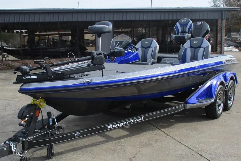 Slide: The Image of 2026 Ranger Z519 Cup-Equipped boat on trailer, blue and gray design. - 3