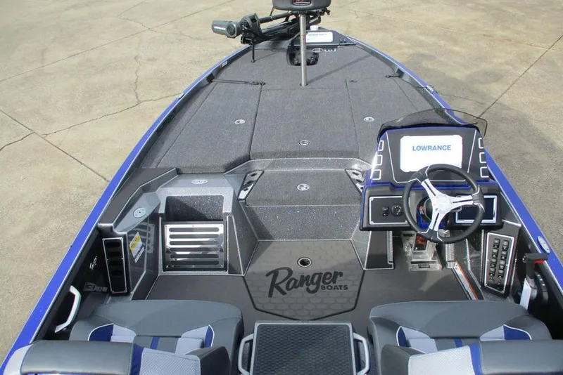 Slide: The Image of 2026 Ranger Z519 Cup-Equipped boat interior with advanced navigation system and steering console. - 8