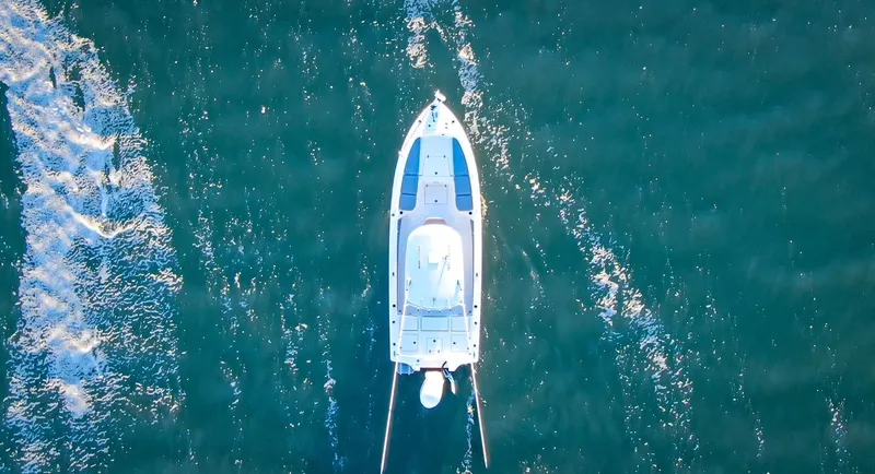 Slide: The Image of Aerial view of a 2024 Pathfinder 2600 TRS on the water. - 12