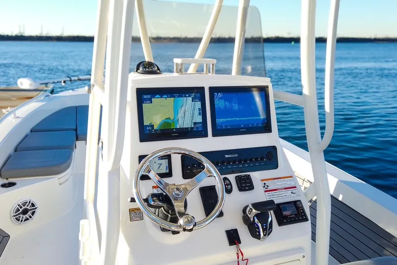 Slide: The Image of 2024 Pathfinder 2600 TRS helm with navigation systems. - 18