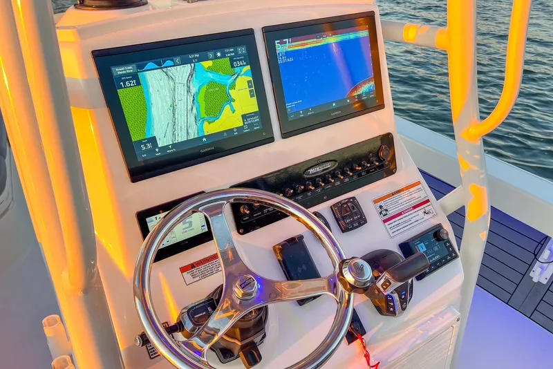 Slide: The Image of Pathfinder 2600 TRS 2024 helm with navigation screens. - 19