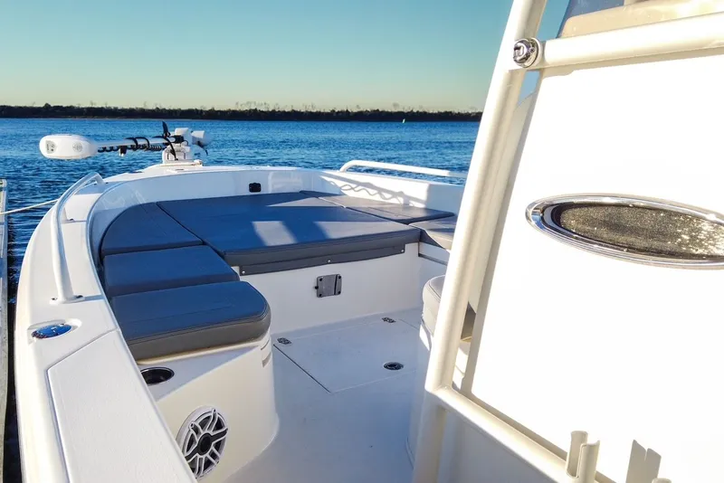 Slide: The Image of 2024 Pathfinder 2600 TRS boat on calm water. - 23