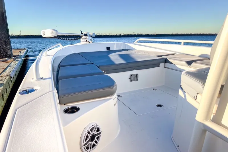 Slide: The Image of 2024 Pathfinder 2600 TRS boat with spacious deck by the water. - 26