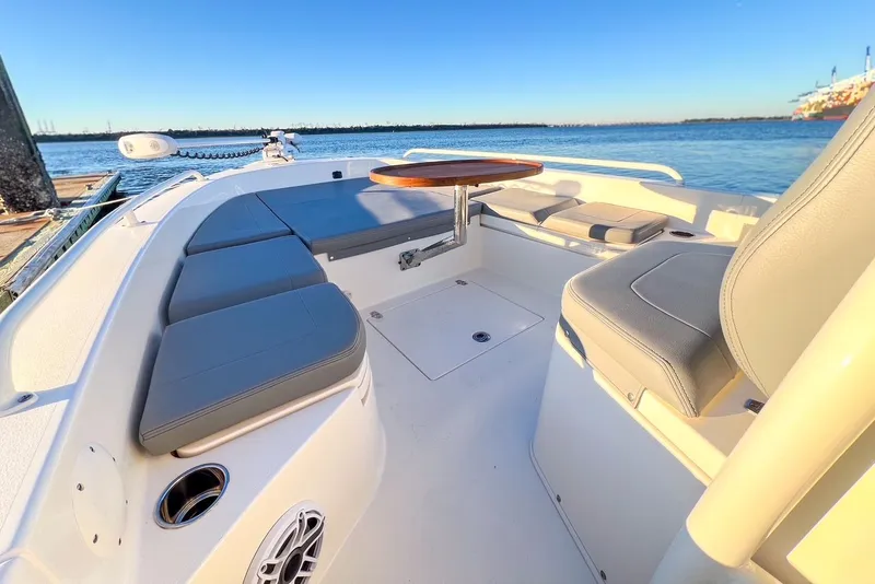 Slide: The Image of Interior of 2024 Pathfinder 2600 TRS with seating area and table. - 28