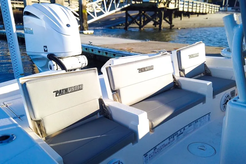 Slide: The Image of 2024 Pathfinder 2600 TRS boat with Yamaha outboard motor. - 32