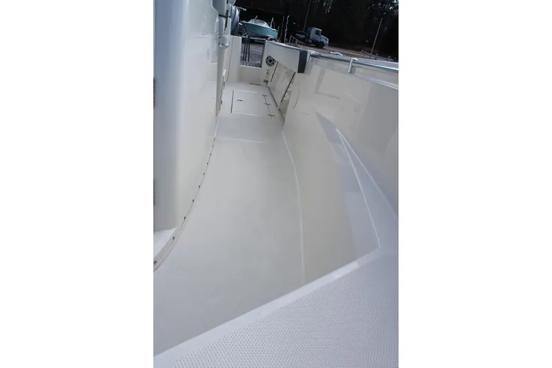 Slide: The Image of 2026 Cobia 285 Center Console boat interior, showcasing spacious deck design. - 33