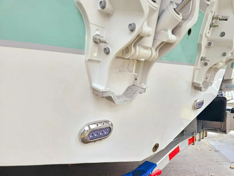 Slide: The Image of 2023 Sea Hunt Escape 28 boat interior bathroom with compact design and modern amenities. - 26