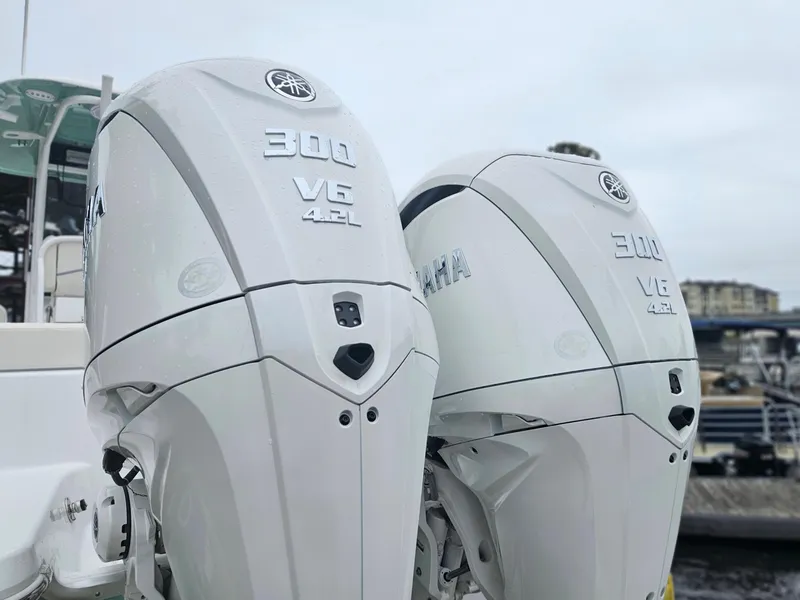 Slide: The Image of Twin Yamaha 300 V6 outboard engines on a 2023 Sea Hunt Escape 28 boat. - 3
