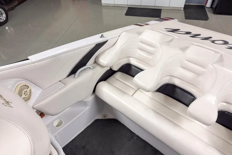 Slide: The Image of Interior of a 2002 Donzi 38 ZX boat with white leather seating. - 19