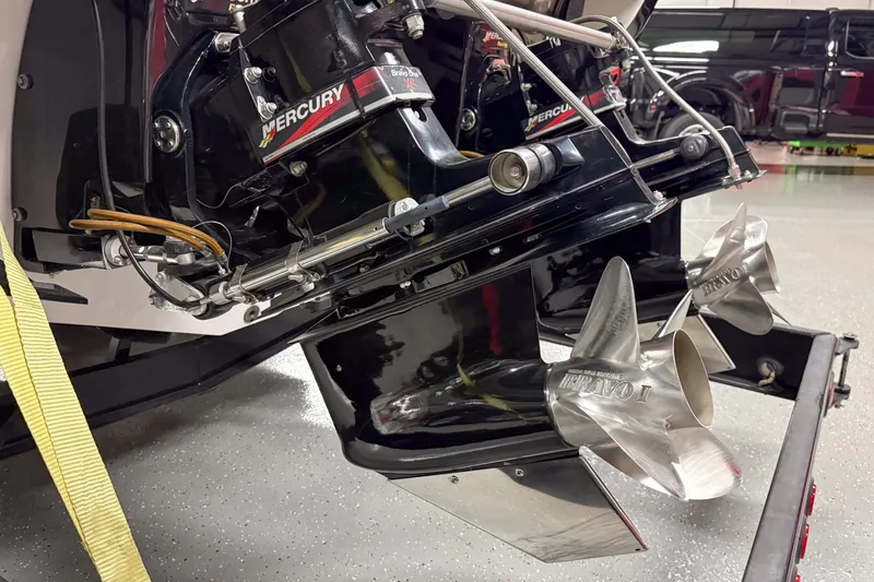 Slide: The Image of 2002 Donzi 38 ZX boat with Mercury Bravo One outdrives and stainless steel propellers. - 4