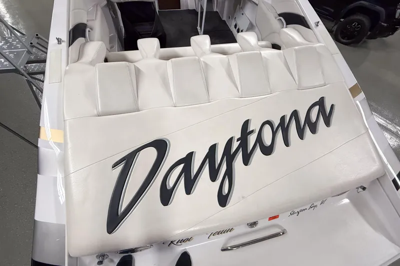 Slide: The Image of 2002 Donzi 38 ZX boat interior with "Daytona" on white upholstery. - 7