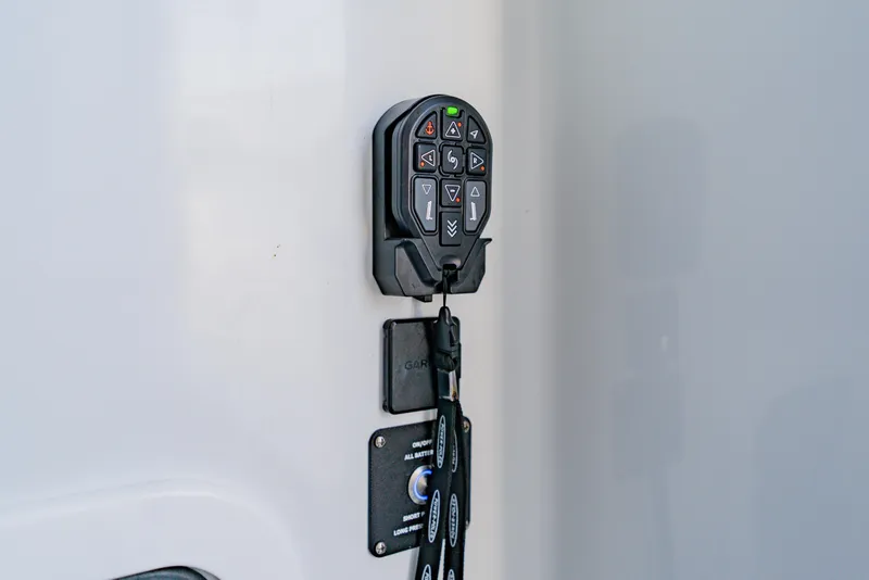 Slide: The Image of Control panel on 2025 Yellowfin 36 Offshore boat, featuring modern navigation buttons. - 21