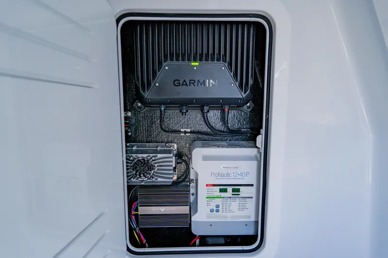 Slide: The Image of Electrical system of 2025 Yellowfin 36 Offshore boat featuring Garmin and ProMariner components. - 22