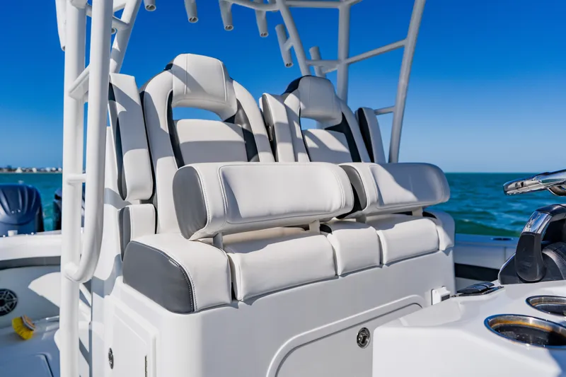 Slide: The Image of 2025 Yellowfin 36 Offshore boat interior with luxurious seating on open water. - 29