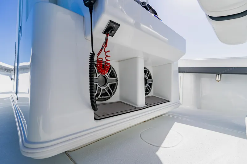 Slide: The Image of 2025 Yellowfin 36 Offshore boat interior with speakers and control panel. - 30