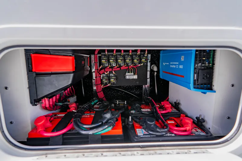 Slide: The Image of Electrical system of 2025 Yellowfin 36 Offshore boat, featuring batteries and inverter. - 37