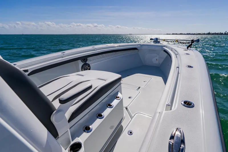 Slide: The Image of 2025 Yellowfin 36 Offshore boat on open sea, showcasing sleek design and spacious deck. - 8