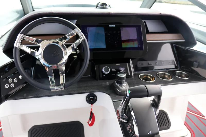 Slide: The Image of Cockpit of 2026 Monterey Elite 30 OB with modern steering and digital display. - 10