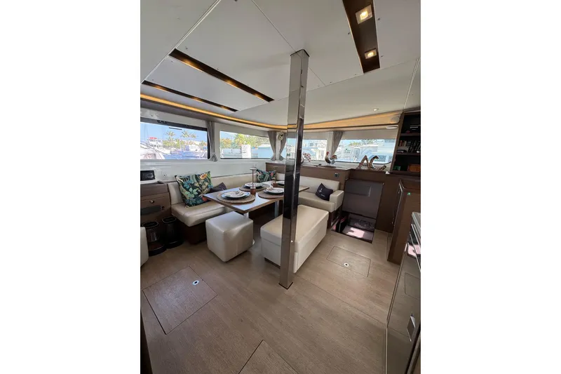 Slide: The Image of Luxurious interior of 2020 Lagoon 46 yacht with elegant dining area and modern decor. - 17