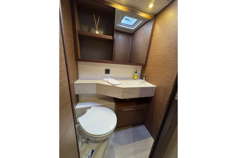 Slide: The Image of Modern bathroom in 2020 Lagoon 46 yacht with sleek design and wooden accents. - 29