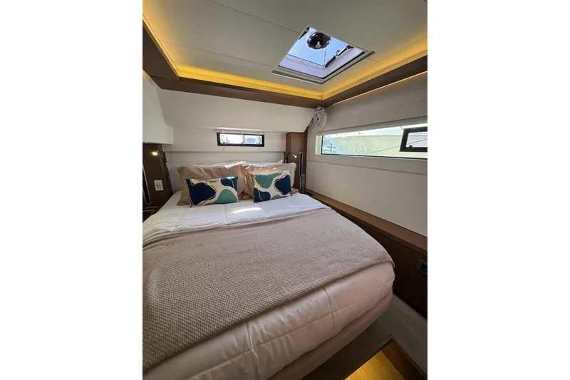 Slide: The Image of Luxurious cabin interior of 2020 Lagoon 46 yacht with skylight and modern bedding. - 32