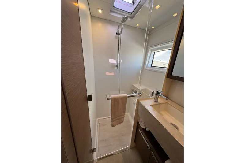 Slide: The Image of Modern bathroom in 2020 Lagoon 46 yacht with shower and sink. - 39
