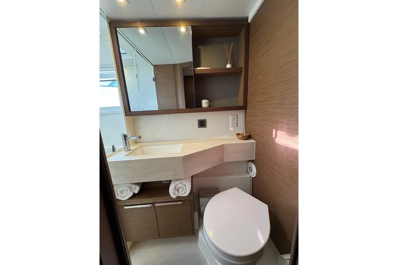 Slide: The Image of Modern bathroom in 2020 Lagoon 46 yacht with sleek fixtures and wooden accents. - 40