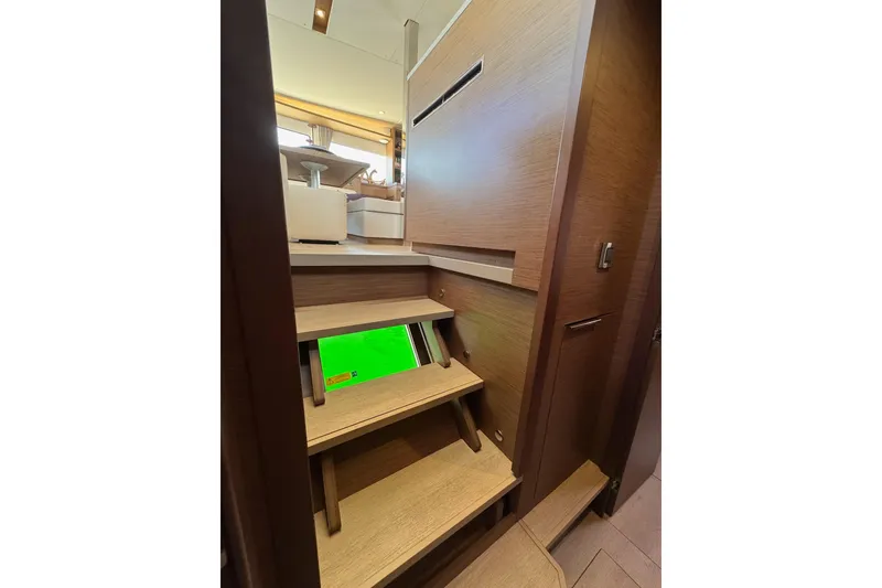 Slide: The Image of Interior stairs of 2020 Lagoon 46 yacht, featuring modern wooden design. - 42
