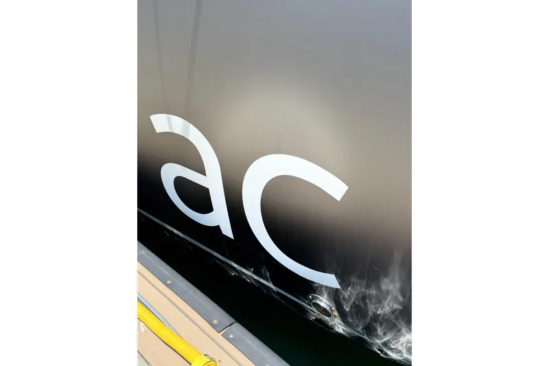 Slide: The Image of Close-up of Lagoon 46 yacht hull with "ac" lettering, 2020 model. - 65