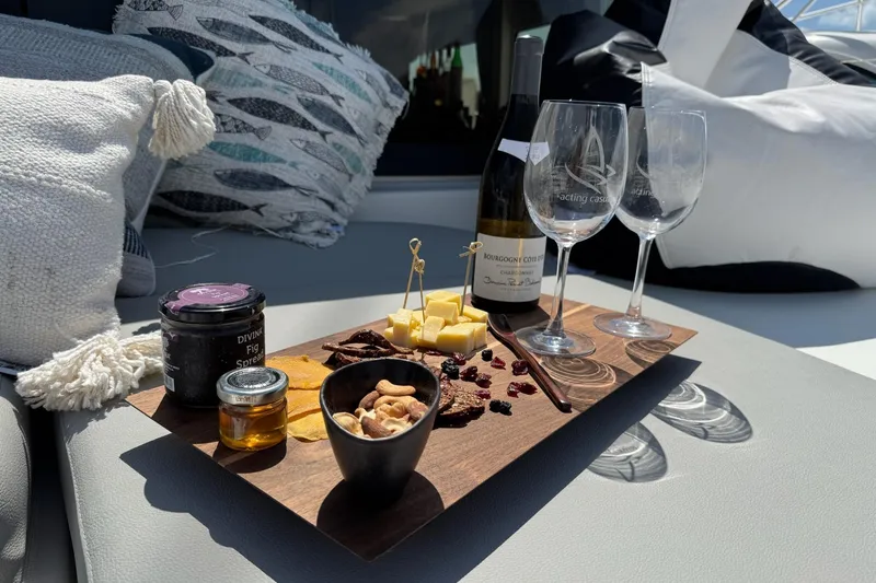 Slide: The Image of Luxurious charcuterie and wine setup on Lagoon 46 yacht, 2020 model. - 74