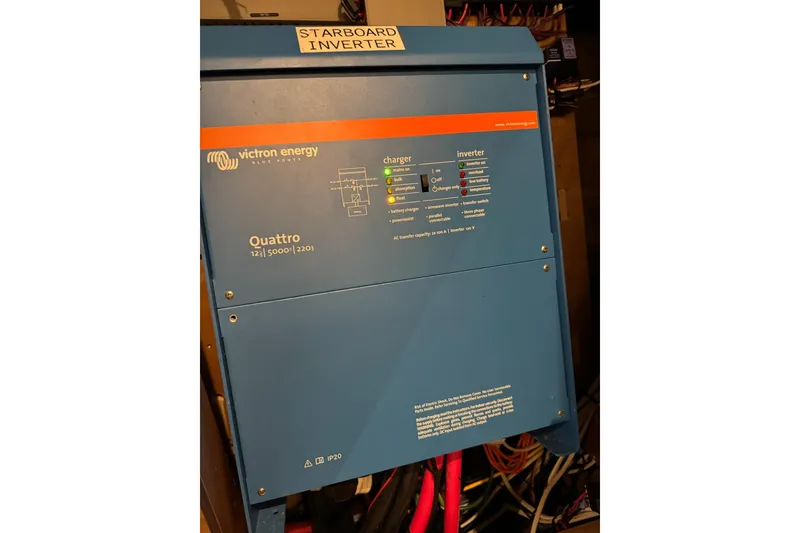Slide: The Image of Victron Energy Quattro inverter on 2020 Lagoon 46 yacht, labeled 'Starboard Inverter.' - 80