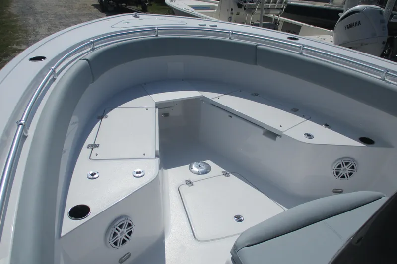 Slide: The Image of 2026 Sportsman Open 252 Center Console boat interior with seating and storage compartments. - 5