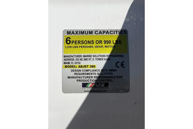 Slide: The Image of 2021 AB Inflatables ABJET 380 capacity label, maximum 6 persons or 990 lbs. - 8