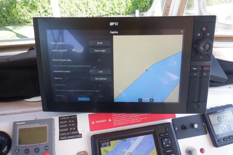 Slide: The Image of Navigation system on 2002 Mainship 430 Trawler displaying depth and contour data. - 27