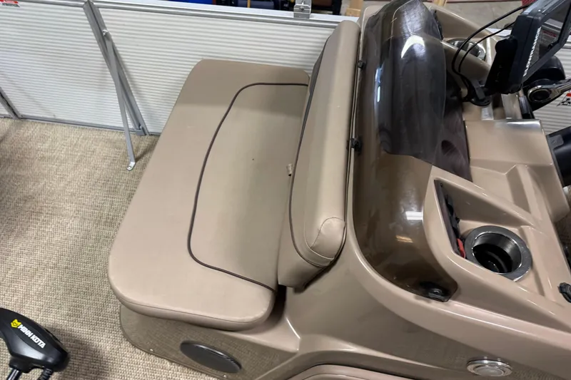 Slide: The Image of 2020 Bennington SX 22 SLX boat interior with beige seating and control panel. - 10