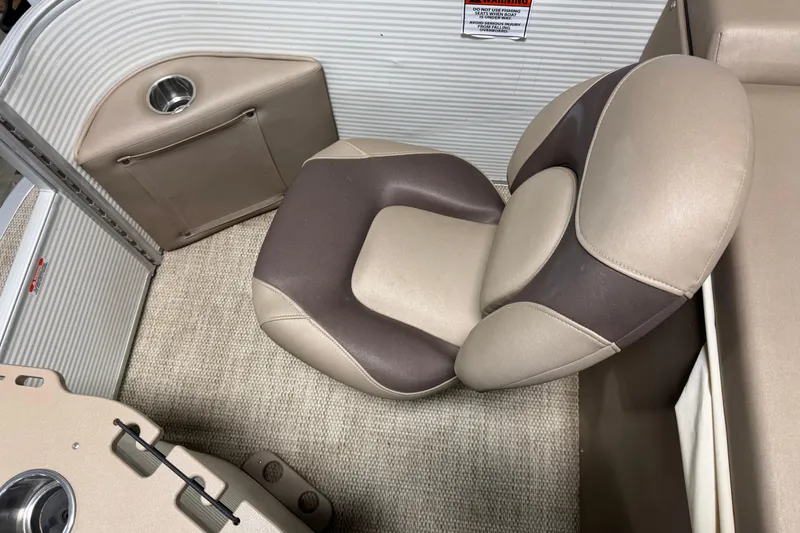 Slide: The Image of 2020 Bennington SX 22 SLX boat interior with beige and brown seating. - 19