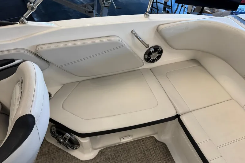 Slide: The Image of Interior of 2020 Sea Ray SPX 210 boat with white seating and speaker. - 9