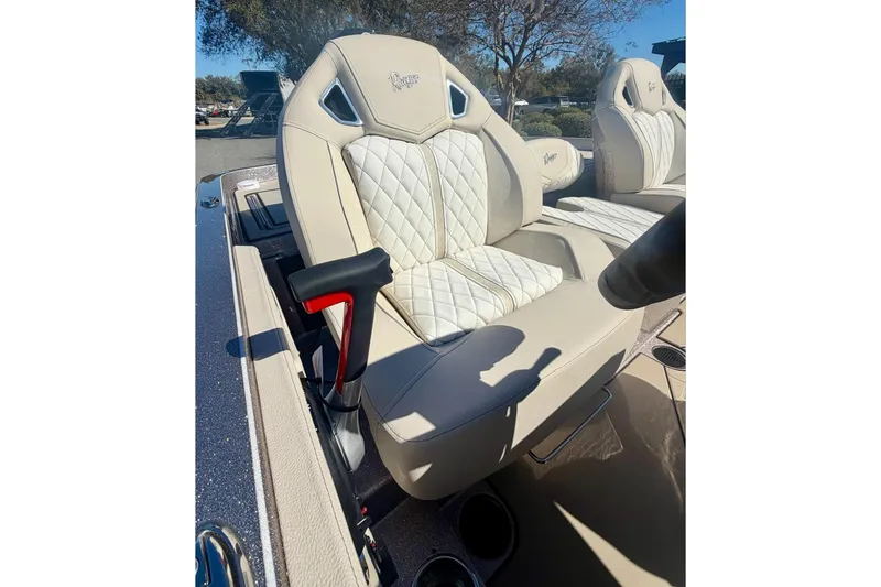 Slide: The Image of Luxurious seating in the 2026 Ranger Z520R Ultra boat, featuring quilted upholstery. - 11