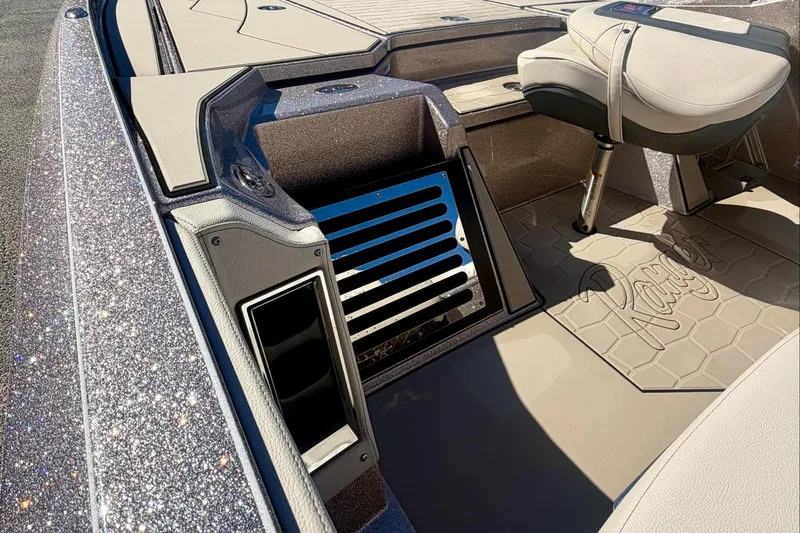 Slide: The Image of 2026 Ranger Z520R Ultra boat interior with sparkling finish and comfortable seating. - 13
