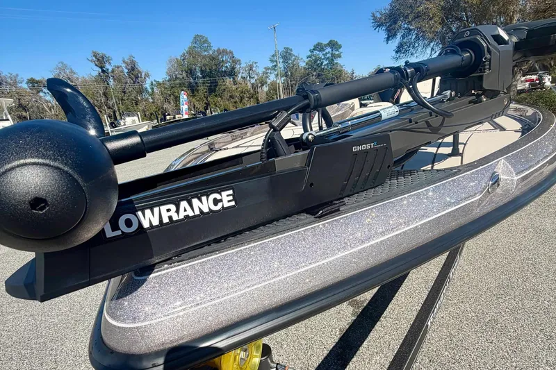 Slide: The Image of 2026 Ranger Z520R Ultra boat with Lowrance Ghost trolling motor, outdoors. - 15