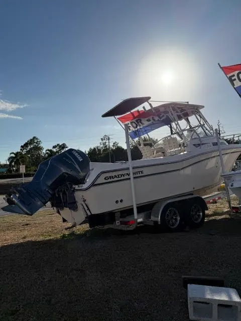 Slide: The Image of 2008 Grady-White Journey 258 boat for sale at sunset. - 2