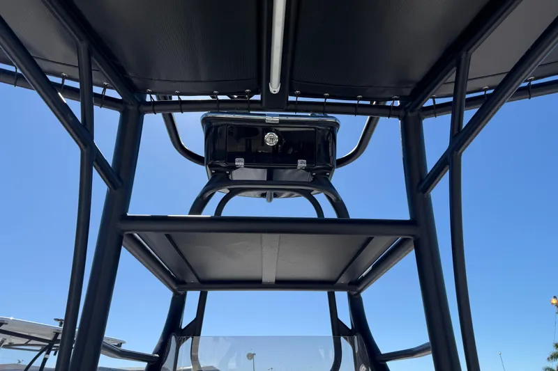 Slide: The Image of 2026 Pathfinder 2600 TRS boat structure against clear blue sky. - 15