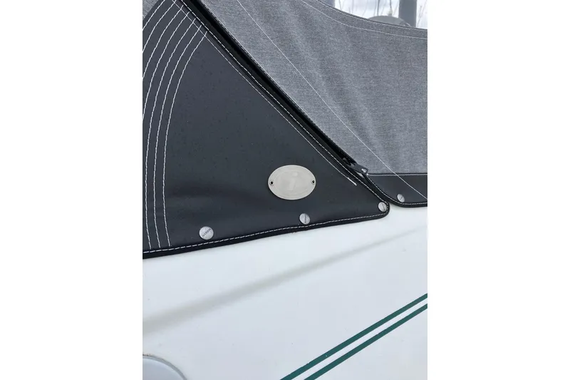 Slide: The Image of Close-up of 1998 Beneteau 381 sailboat canvas cover with stitching details. - 11