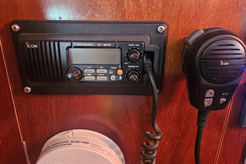 Slide: The Image of VHF marine radio and microphone on 1998 Beneteau 381 yacht interior. - 36